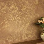 Concrete wall decoration with gilding