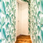 Turquoise wallpaper in the hallway
