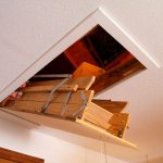 image of an attic hatch with a ladder