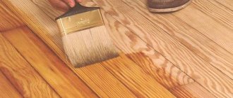 Apply varnish to the floor with a brush
