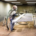 Cleaning the surface with sandblasting