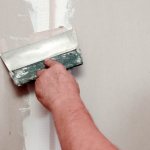 The process of puttying the joint of plasterboard sheets