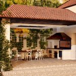 Veranda for a house with a barbecue: practical ideas for your home