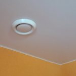 Hood under a suspended ceiling: in the kitchen and bathroom