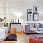 Bright light from a table lamp in a bright bedroom-living room